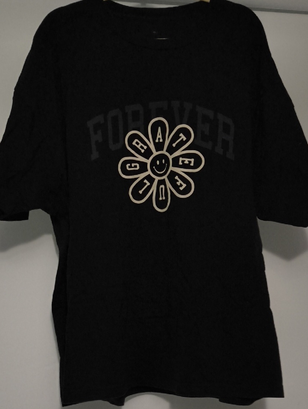 Kids Black Graphic Tee with Daisy Smile Logo